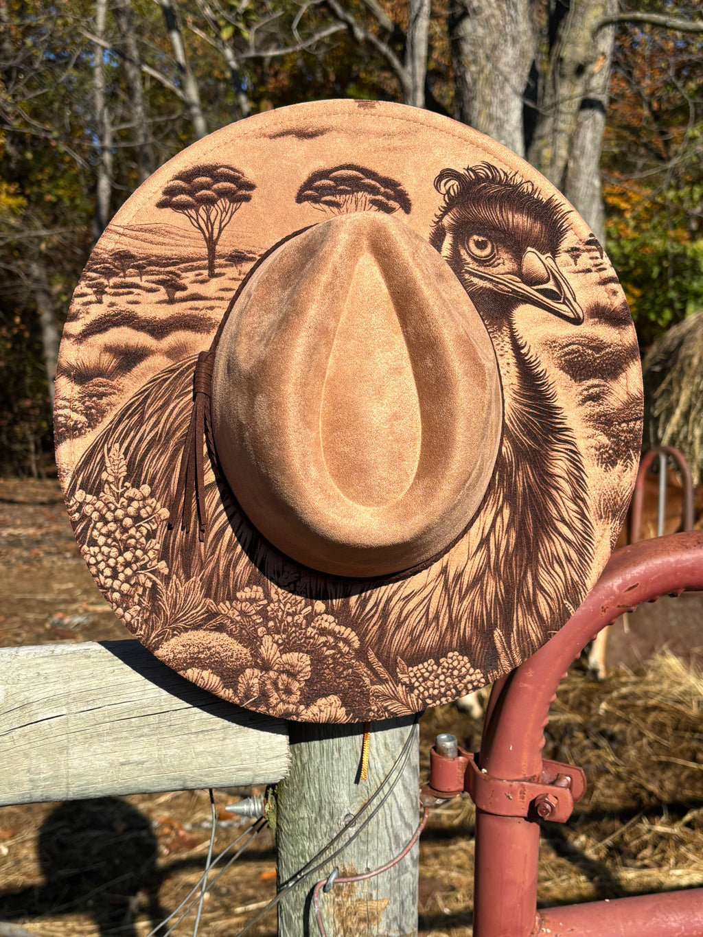 Engraved suede fedora hat in tan with engraved bird and landscape artwork