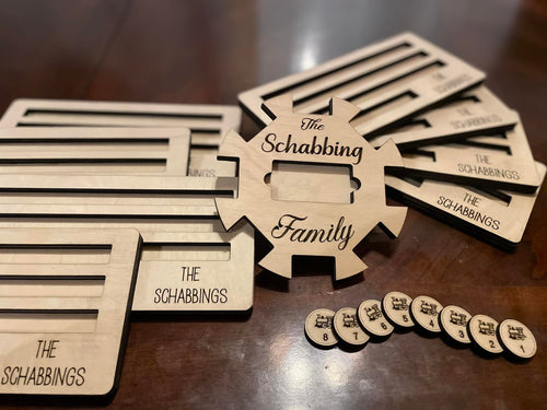 Mexican train domino set with wooden tile holders and round numbered domino pieces