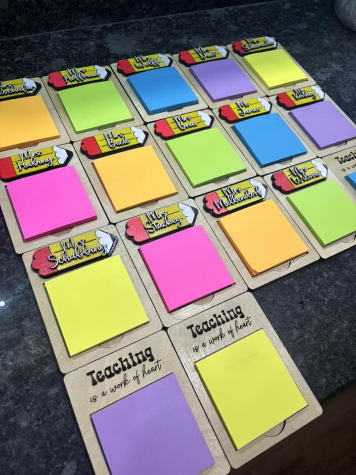 Multiple teacher note holders with kraft cards and stacked colorful sticky notes