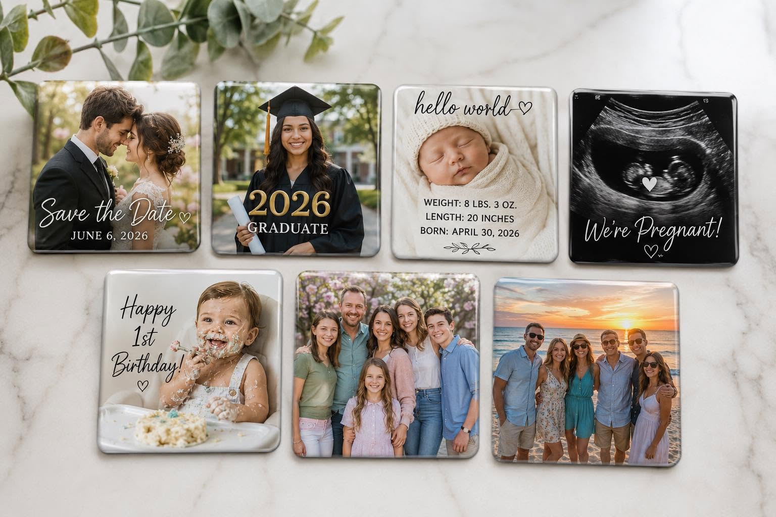 Collection of personalized photo coasters on a marble surface